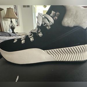 Sorel black and white winter boots